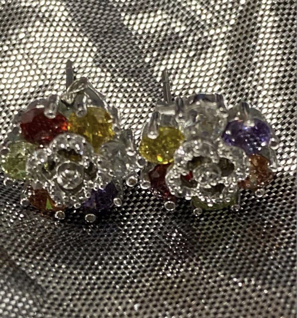 Colorful crystal flower cluster stud earrings silver tone (Category: Earrings) located in Manila. Submitted by bwshoppe (Listing ID 1465049175, Image 2). Description: - Design: Adorable flower-shaped cluster studs in silver-tone metal - Details: Multi-colored round crystals surrounding a central flower motif - Closure: Standard butterfly push backs for secure wear - Versatility: Sparkly statement piece suitable for daily wear or special occasions