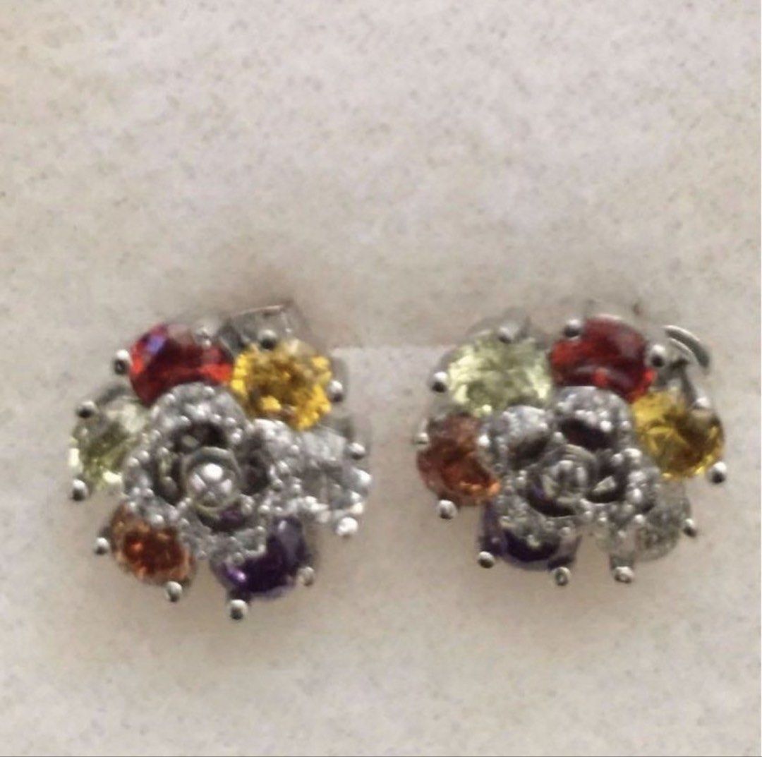 Colorful crystal flower cluster stud earrings silver tone (Category: Earrings) located in Manila. Submitted by bwshoppe (Listing ID 1465049175, Image 1). Description: - Design: Adorable flower-shaped cluster studs in silver-tone metal - Details: Multi-colored round crystals surrounding a central flower motif - Closure: Standard butterfly push backs for secure wear - Versatility: Sparkly statement piece suitable for daily wear or special occasions