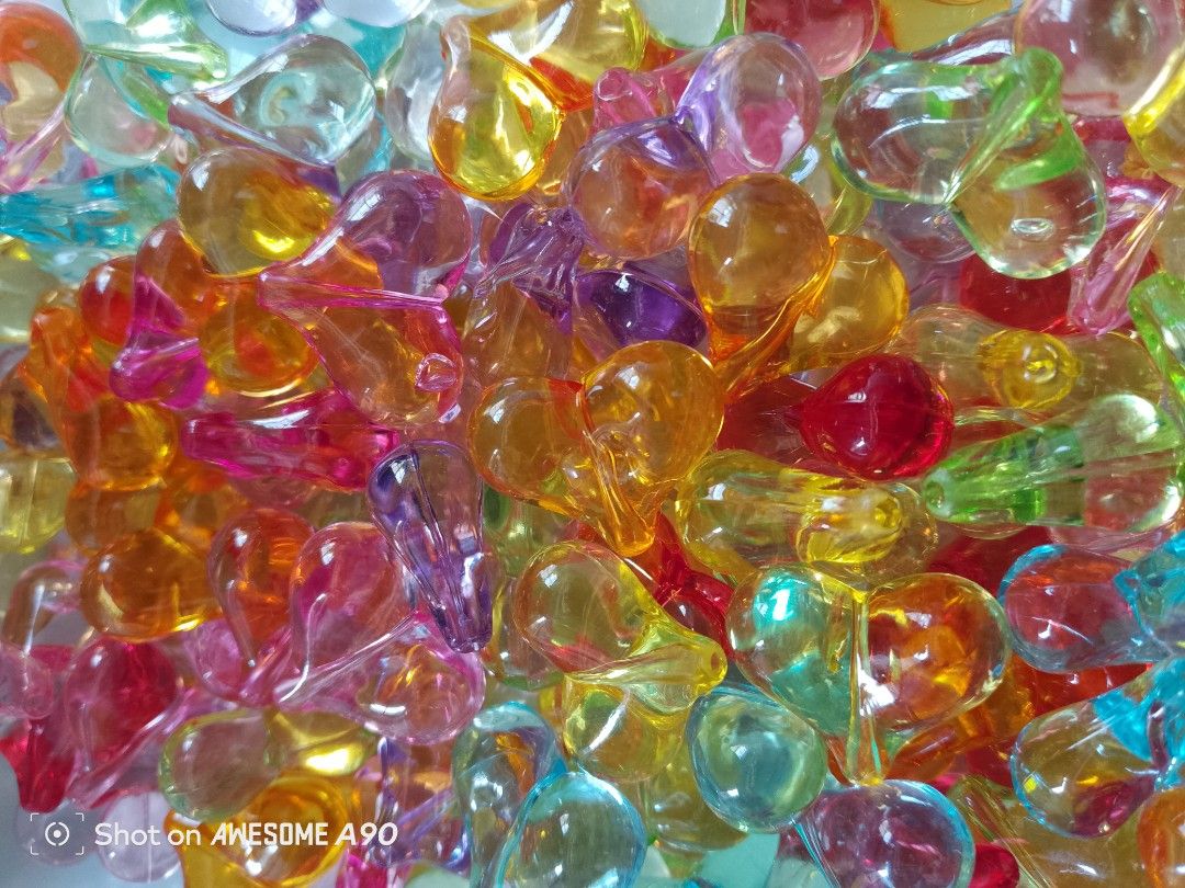 Colorful heart-shaped translucent acrylic beads bulk set (Category: Craft Supplies & Tools) located in San Jose del Monte. Submitted by dollies18 (Listing ID 1465021170, Image 2). Description: - Assorted heart beads in vibrant transparent colors (pink, orange, yellow, blue, purple, green) - Smooth and glossy finish - Ideal for jewelry making, friendship bracelets, keychains, and DIY crafts - Includes a convenient clear plastic storage container -