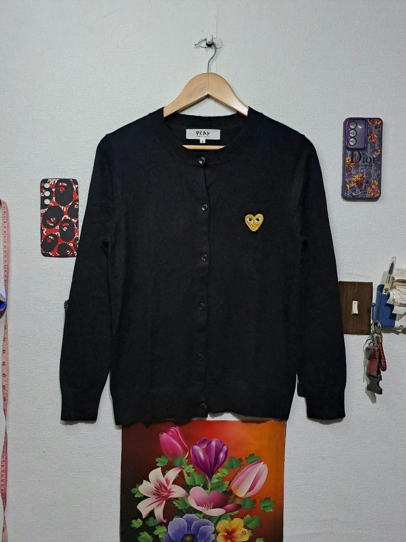 Comme des Garçons Wool Cardigan (Category: Coats, Jackets and Outerwear) located in Quezon City. Submitted by yaseen73 (Listing ID 1465154879, Image 1). Description: CDG PLAY Comme des Garçon Co., Ltd AZ - T026 Black Wool Cardigan With an Embroidered Gold Heart Emblem on the Chest Made in Japan Wearing Size : Small on Tag Dimensions : Please Refer to the Photo Color Rate : 9.9/10 Pristine Condition - Ready To Wear 🔥🔥🔥PRE - OWNED🔥🔥🔥 or Best 