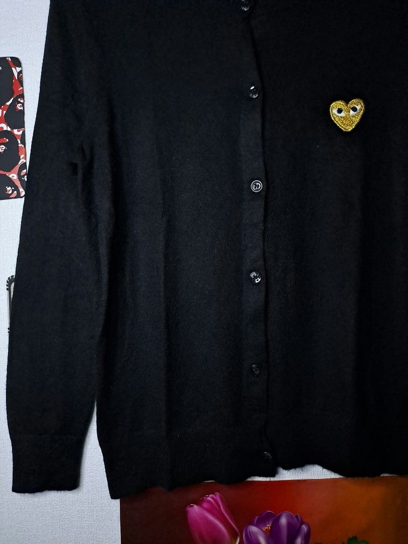 Comme des Garçons Wool Cardigan (Category: Coats, Jackets and Outerwear) located in Quezon City. Submitted by yaseen73 (Listing ID 1465154879, Image 3). Description: CDG PLAY Comme des Garçon Co., Ltd AZ - T026 Black Wool Cardigan With an Embroidered Gold Heart Emblem on the Chest Made in Japan Wearing Size : Small on Tag Dimensions : Please Refer to the Photo Color Rate : 9.9/10 Pristine Condition - Ready To Wear 🔥🔥🔥PRE - OWNED🔥🔥🔥 or Best 