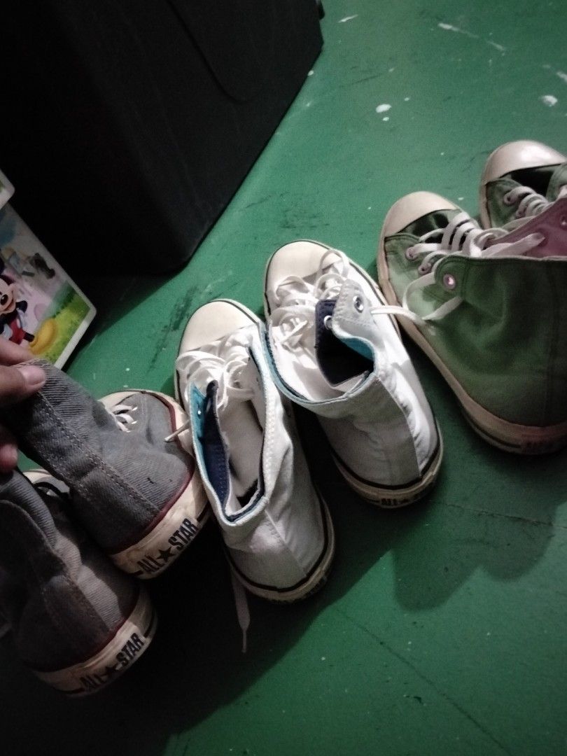 Converse All Star High Top Sneakers Assorted Colors (Category: Sneakers) located in Caloocan City. Submitted by jalexisjoy47916 (Listing ID 1465022612, Image 1). Description: Bundle of multiple Converse All Star high top sneakers. Includes grey, white, green, and black pairs. Classic canvas build with rubber toe caps and lace-up fronts. White laces on all pairs. Casual everyday streetwear shoes. Multiple pairs available in various colors..
