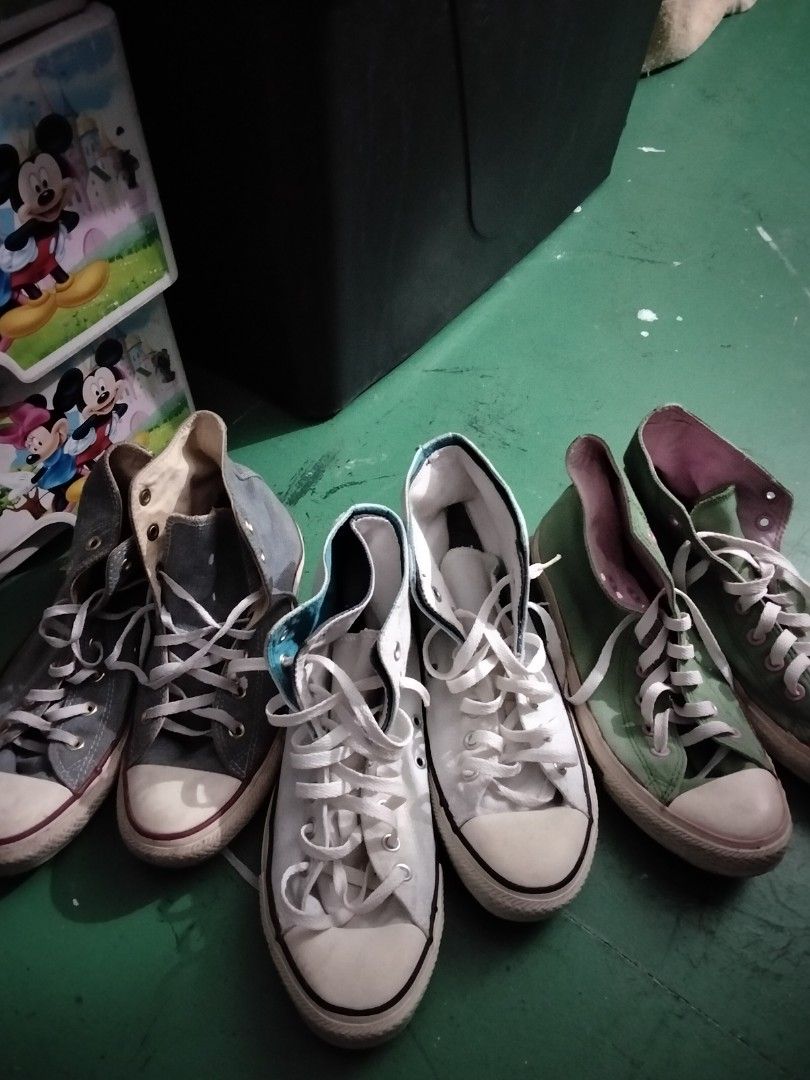 Converse All Star High Top Sneakers Assorted Colors (Category: Sneakers) located in Caloocan City. Submitted by jalexisjoy47916 (Listing ID 1465022612, Image 3). Description: Bundle of multiple Converse All Star high top sneakers. Includes grey, white, green, and black pairs. Classic canvas build with rubber toe caps and lace-up fronts. White laces on all pairs. Casual everyday streetwear shoes. Multiple pairs available in various colors..