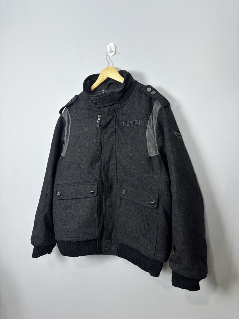 Coogi Black Wool Bomber Jacket Size L (Category: Coats, Jackets and Outerwear) located in Mabalacat. Submitted by doughnutthrift (Listing ID 1465093443, Image 2). Description: VINTAGE COOGI BOMBER JACKET Excellent condition W- 26” L- 28” No issues.