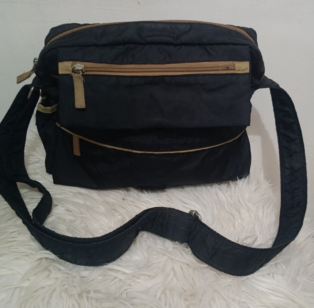 Cool dog Headquarters Canvas Crossbody Bag (Category: Sling Bags) located in Davao. Submitted by naxarugal (Listing ID 1464973672, Image 1). Description: ukay source no issue size length 12 inches width 3.5 inches height 8.5 inches.