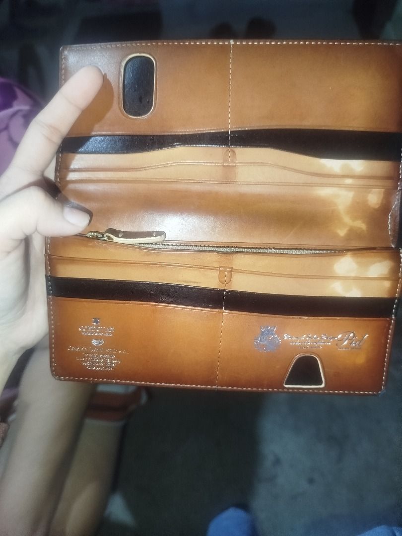 Cordovan (Category: Luxury Bags & Wallets) located in Caloocan City. Submitted by goldenwind.7a6044 (Listing ID 1464986196, Image 1). Description: This high-quality P.I.D. long wallet is made with strong Cordovan horse leather and real Italian Vacchetta leather. It is great for everyday use because it has many slots for cards, cash pockets, and a safe zipper for coins. .