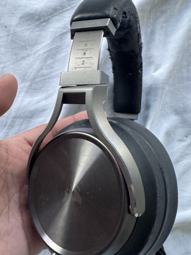 Corsair Wireless Gaming Headset with USB Dongle and Cable (Category: Headphones & Headsets) located in Cavite. Submitted by marcuz1316 (Listing ID 1465158256, Image 2). Description: - Corsair wireless gaming headset (Black) - Includes USB wireless transmitter dongle and charging cable - Fully functional for PC and console gaming - Ear cushions are in decent shape - Headband padding shows severe flaking and wear on the faux leather.