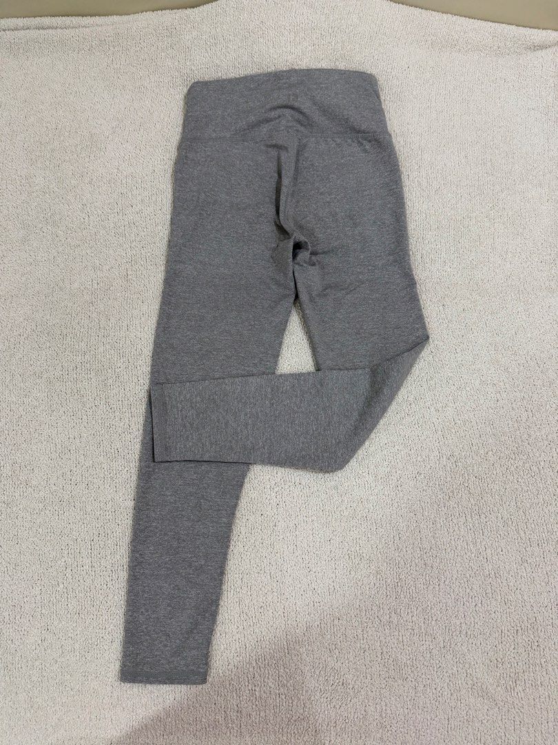 Cotton On Leggings S (Category: Activewear) located in Subic. Submitted by kittysclosetsale (Listing ID 1465013148, Image 2). Description: - Brand: Cotton On - Style: Activewear leggings with a flattering high-waist design - Color: Heather grey - Size: S (tag printed inside waistband) - Material: Stretchy, comfortable cotton-blend - Condition: Clean overall, great for the gym or everyday lounging - Origin: Made in China.