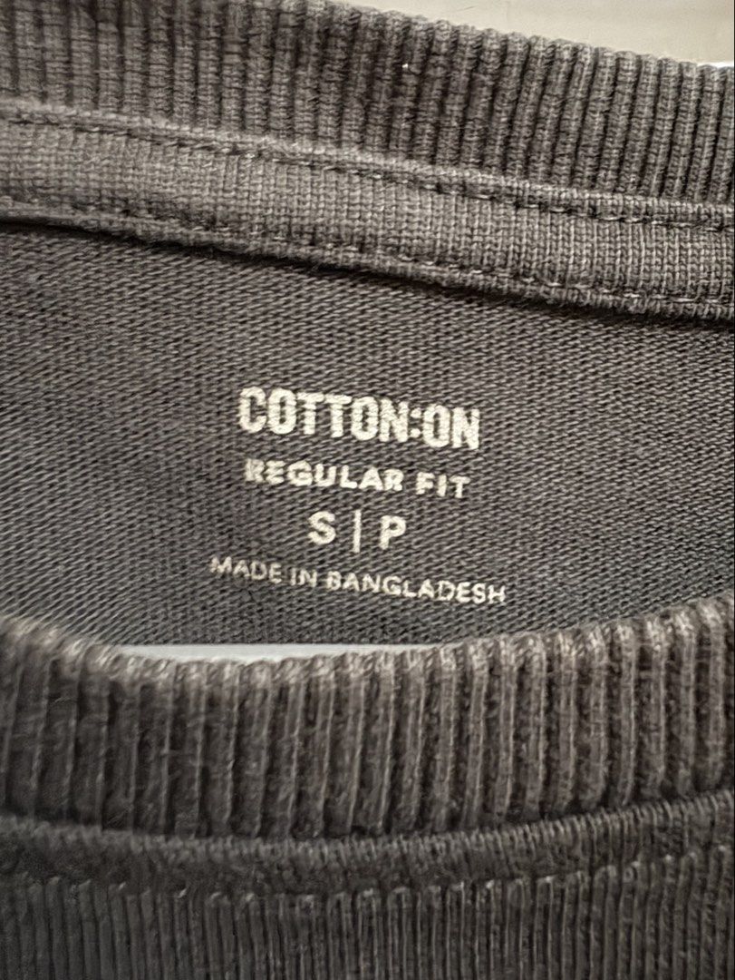 Cotton On Regular Fit Dark grey Tshirt (Category: Shirts) located in Manila. Submitted by margascloset_ (Listing ID 1465054327, Image 3). Description: - Color: Dark grey - Size: Small, Regular fit (can fit size small to medium) - Design: 'ETRE MAGIQUE' front text, ribbed crew neckline - Condition: like new, only used it twice RFS: Decluttering / no longer used MOD: J&t, LBC, Lalamove, Grab MOP: Gcash / Bank.