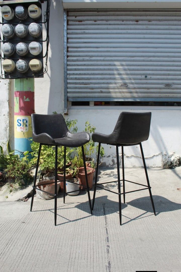 Counter/Bar Chair (Category: Chairs) located in Meycauayan. Submitted by marygracecasimiro (Listing ID 1465170272, Image 2). Description: Counter / Bar Chairs Set of 2 Risley S counter chairs with dark charcoal leather seats, black powder-coated steel frames and built-in footrests. Modern and versatile, perfect for kitchen counters, cafes, bars or office lounges L:18 ½ • W:17 • Seat H:28 • Back H:37 ¾ inches Set for only 9,900 pesos💚.
