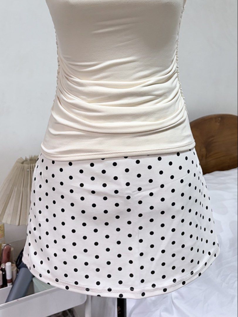 Cream Polkadot Mini Skirt (Category: Skirts) located in Bambang. Submitted by gigisells_ (Listing ID 1465159687, Image 2). Description: never used, too big on me size 26-30 stretch 14.5” length w/ inner shorts.