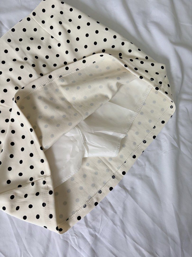 Cream Polkadot Mini Skirt (Category: Skirts) located in Bambang. Submitted by gigisells_ (Listing ID 1465159687, Image 3). Description: never used, too big on me size 26-30 stretch 14.5” length w/ inner shorts.