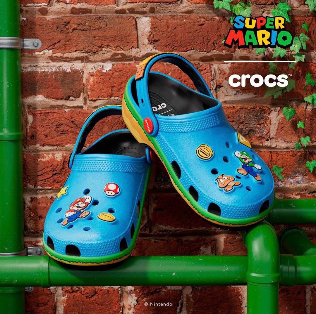 Crocs x Nintendo Classics ‘Super Mario’ (Category: Slippers & Slides) located in Manila. Submitted by collectorfinds (Listing ID 1465043137, Image 2). Description: “POWER UP YOUR STYLE.” 🍄🔥 🚨 OPENING SALE Crocs x Nintendo Classics ‘Super Mario’ Men’s US Size 10 ❌ Before ₱ 6,985 ✅ NOW ₱ 5,895 ONLY 📩 PM us to purchase 📍2nd Floor, 317 Fernando Poe Jr Ave . Quezon City. Right above Yamaha near LRT 1 - Roosevelt Station. 📈 Prices subject to chan
