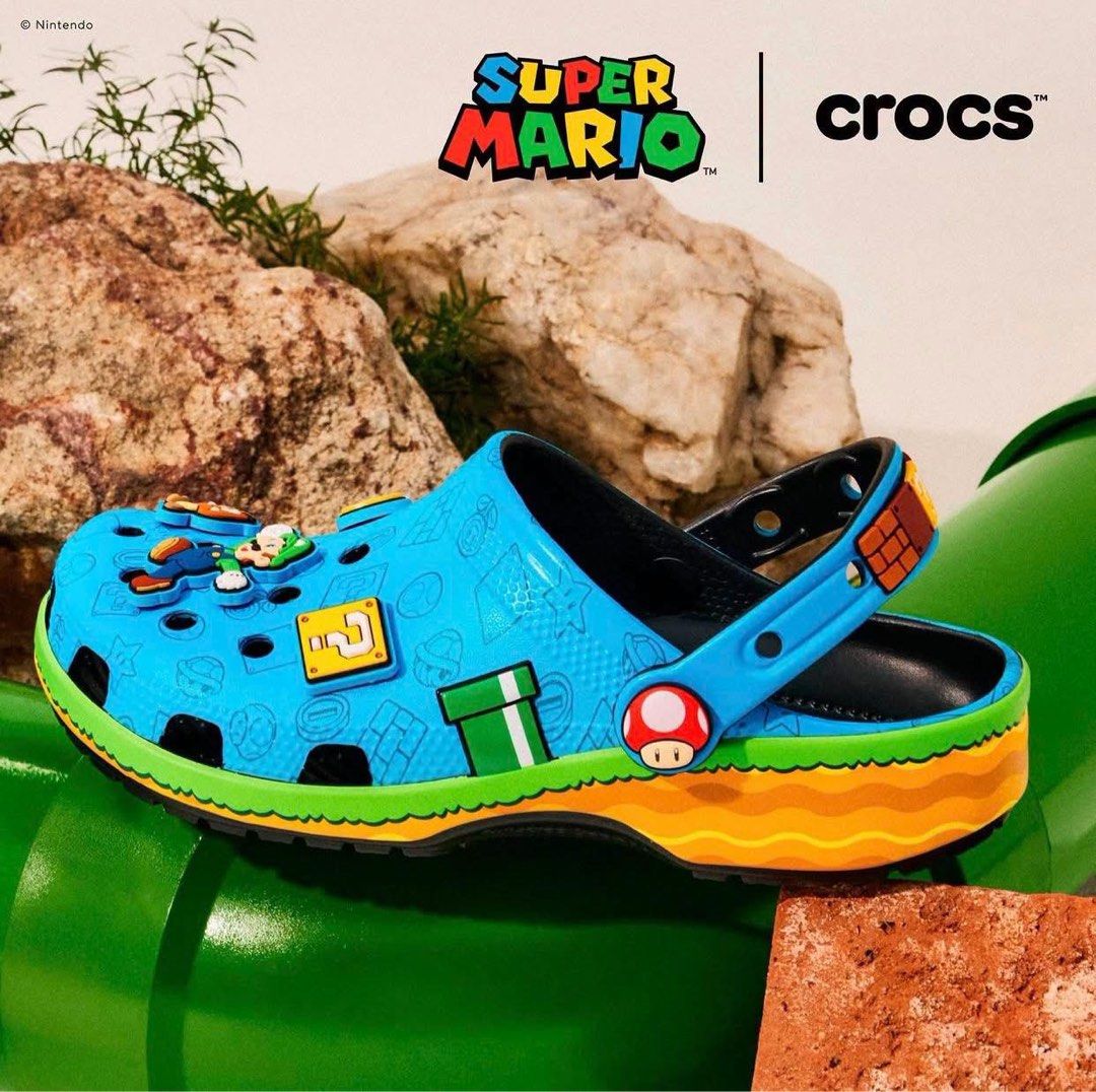 Crocs x Nintendo Classics ‘Super Mario’ (Category: Slippers & Slides) located in Manila. Submitted by collectorfinds (Listing ID 1465043137, Image 1). Description: “POWER UP YOUR STYLE.” 🍄🔥 🚨 OPENING SALE Crocs x Nintendo Classics ‘Super Mario’ Men’s US Size 10 ❌ Before ₱ 6,985 ✅ NOW ₱ 5,895 ONLY 📩 PM us to purchase 📍2nd Floor, 317 Fernando Poe Jr Ave . Quezon City. Right above Yamaha near LRT 1 - Roosevelt Station. 📈 Prices subject to chan