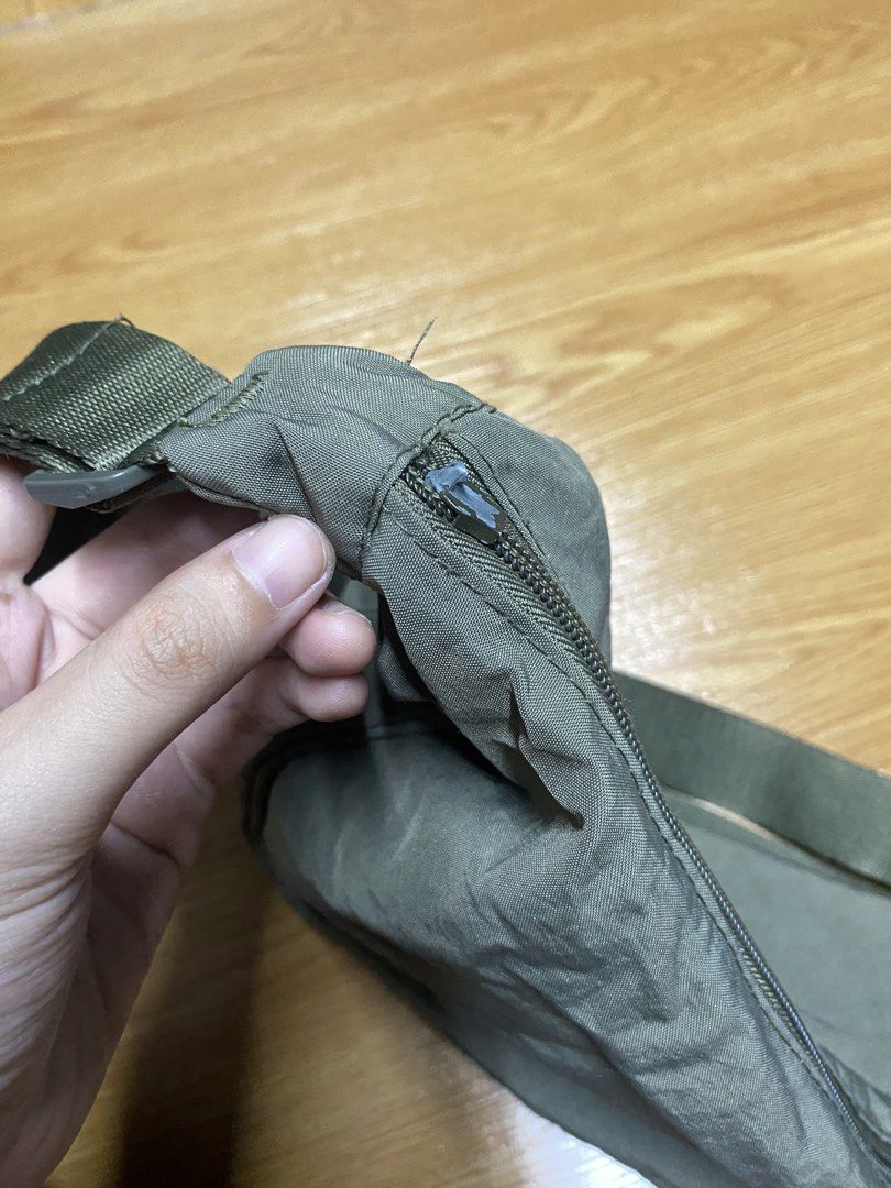Crossbody Sling Bag (Category: Cross-body Bags) located in Marikina City. Submitted by unknownus.eri (Listing ID 1465073609, Image 2). Description: Both zippers have defect. Olive is from surplus and black is from sm department store. Buy 1 get 2 na lang. fixed price. Sf shouldered ng buyer. .