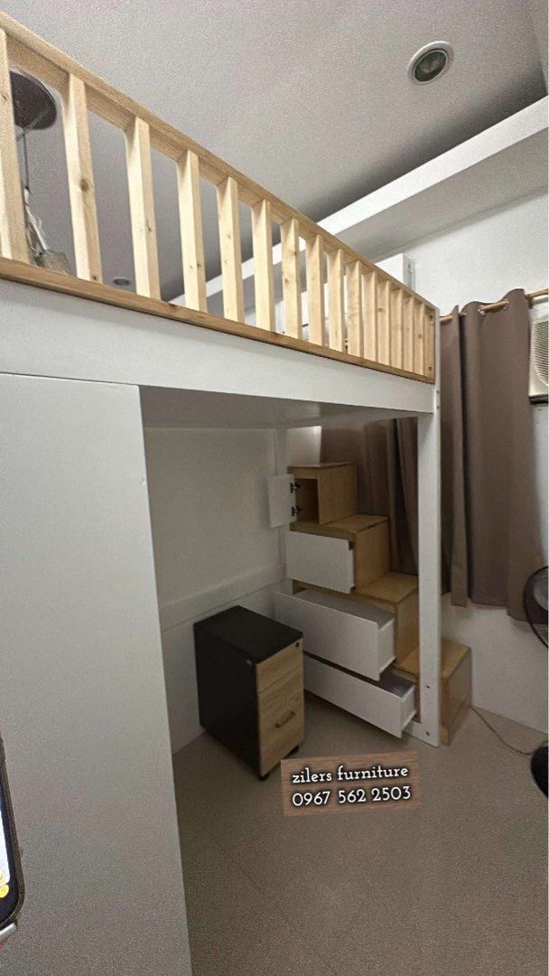 Custom Loft Bed with Wardrobe and Stair Drawers (Category: Shelves, Cabinets & Racks) located in Las Pinas. Submitted by rhoannee18 (Listing ID 1464994563, Image 2). Description: - Custom-made by Zilers Furniture in a stylish white and natural wood finish - Built-in wardrobe with smooth sliding doors underneath the bed - Integrated storage stairs that double as convenient pull-out drawers - Sturdy wooden safety railing around the top sleeping are