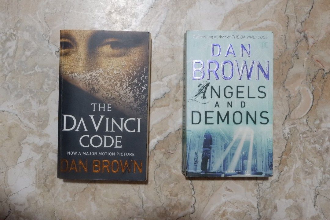 Dan Brown Books Bundle: The Da Vinci Code and Angels and Demons (Category: Storybooks) located in Manila. Submitted by kobsdr (Listing ID 1465044151, Image 3). Description: - Bundle of 2 Dan Brown thrillers: The Da Vinci Code & Angels & Demons - Features the iconic Robert Langdon series - Format: Mass Market Paperback - Condition: Normal shelf wear, yellowed pages due to age, but completely clean inside for reading - Perfect for mystery and suspe