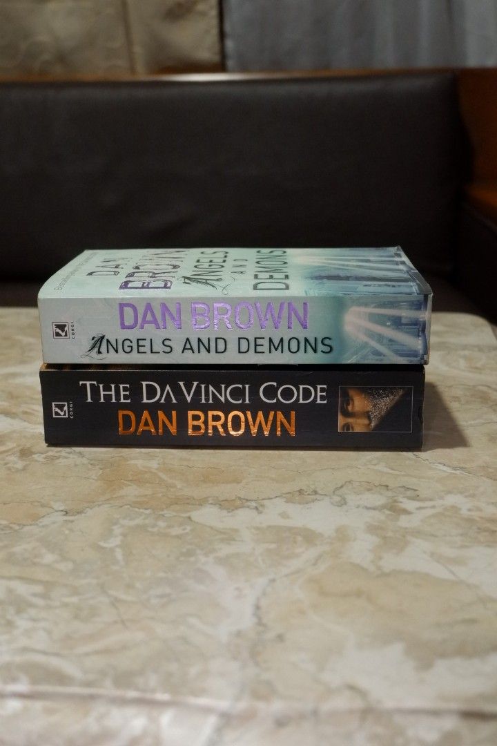 Dan Brown Books Bundle: The Da Vinci Code and Angels and Demons (Category: Storybooks) located in Manila. Submitted by kobsdr (Listing ID 1465044151, Image 1). Description: - Bundle of 2 Dan Brown thrillers: The Da Vinci Code & Angels & Demons - Features the iconic Robert Langdon series - Format: Mass Market Paperback - Condition: Normal shelf wear, yellowed pages due to age, but completely clean inside for reading - Perfect for mystery and suspe