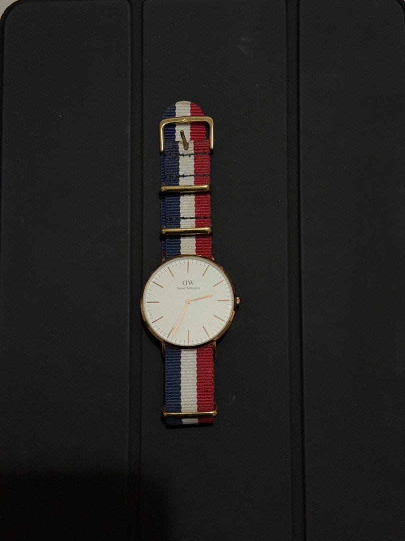 Daniel Wellington Watch (Category: Men's Watches) located in Manila. Submitted by declutterbyecb (Listing ID 1465014841, Image 1). Description: -Watch only with aftermarket strap -Small scratch.