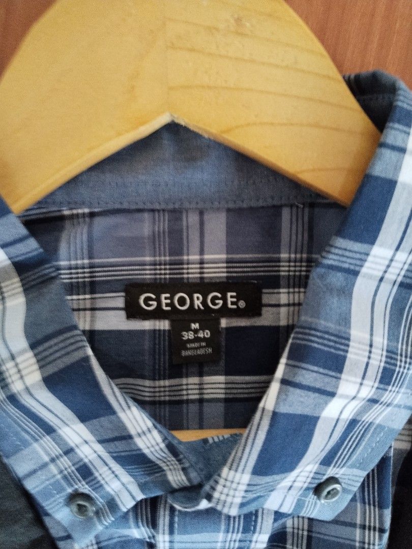 Dark Gray Blazer (Category: Coats, Jackets and Outerwear) located in Mabalacat. Submitted by al_amin_thrift (Listing ID 1464969268, Image 3). Description: 🧥 Set 1 — Dark Gray Blazer + George Blue Plaid Shirt Details - Blazer: Classic dark charcoal gray blazer — 2-button, notch lapels, chest + 2 front pockets ​ - Measurements: 29" length × 21" chest (approx. XL) ​ - Shirt: George — light blue plaid button-down, soft cotton, size L/XL ​ - Fabric: 