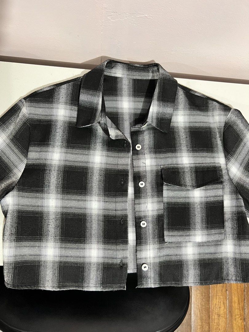 Dazy Black and White Plaid Button-Down Shirt Size S (Category: Shirts) located in Manila. Submitted by colesj (Listing ID 1465169118, Image 1). Description: - Size: Small - Color/Pattern: Black and white plaid - Style: Crop length, button-down with classic collar and single chest pocket - Styling: Easy to match with high-waisted jeans or skirts Thick and comfy cropped flannel from SHEIN. Used only once and still in very good condition. - Thick fa