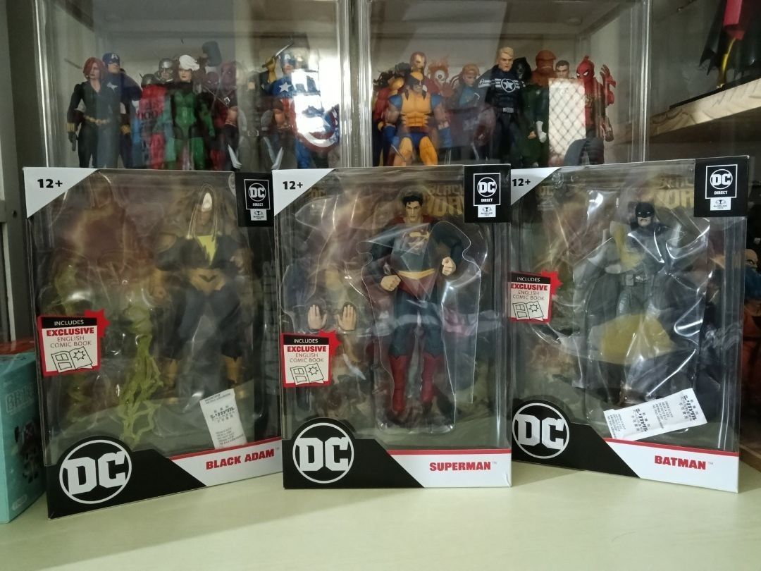 DC Multiverse Black Adam Superman Batman Action Figures (Category: Figurines & Statues) located in Manila. Submitted by elgato1946 (Listing ID 1465021362, Image 1). Description: - Set of 3 DC figures: Black Adam, Superman, and Batman - Includes original packaging for all figures - Each box comes with an exclusive comic book - Brand new and untouched - Kept safe in secure shelf storage - Ideal for DC fans and collectors.