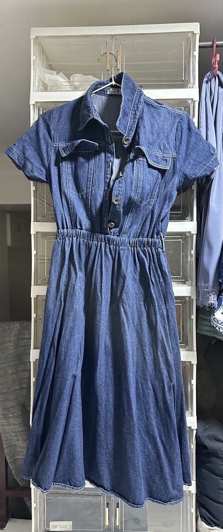 Denim dress (Category: Dresses) located in Manila. Submitted by okaykloset (Listing ID 1464994622, Image 1). Description: Rfs: decluttering dresses Free size but best fit for s-m (stretchable waist) Below the knee dress MOP: gcash/gotyme MOD: lalamove (sdd)/jnt.