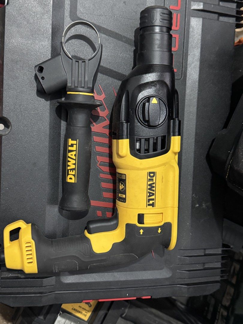 Dewalt D25133-QS SDS-Plus Rotary Hammer Drill (Category: Construction Tools & Equipment) located in Cavite. Submitted by marcuz1316 (Listing ID 1465158667, Image 1). Description: - Brand: Dewalt (Model: D25133-QS) - Power: 800W, 230V corded - Performance: Up to 1500 RPM and 5500 BPM impact rate - Inclusions: Side handle attachment included - Condition: Heavy-duty and reliable power tool for tough drilling tasks.
