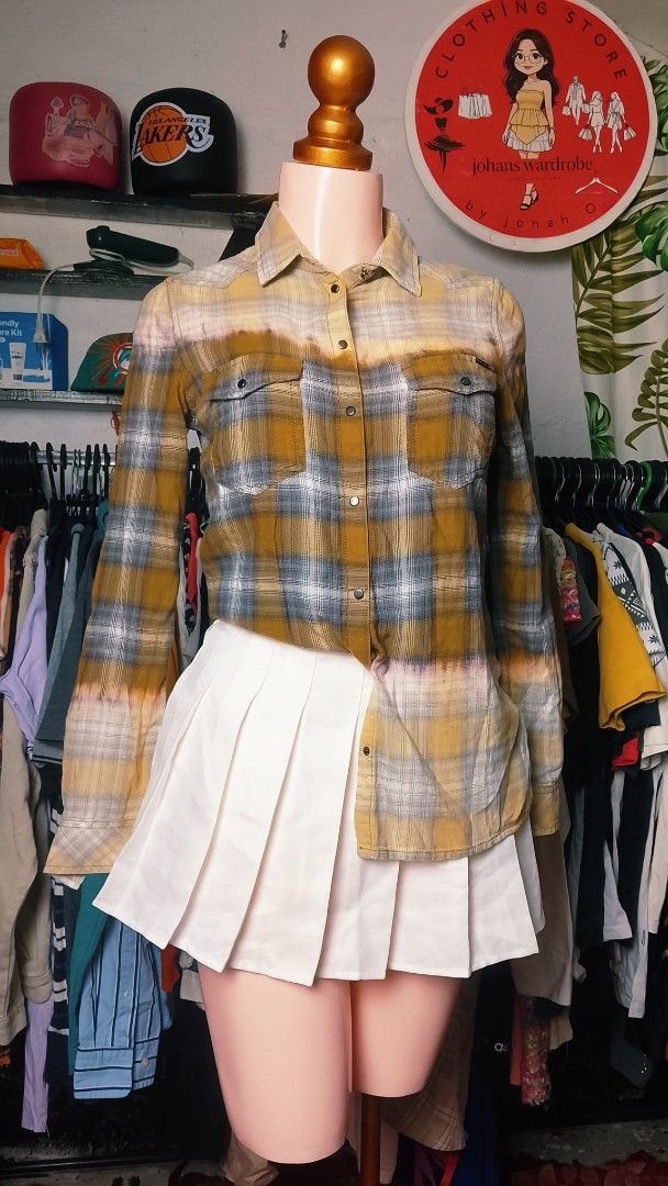 Diesel Yellow Grey Plaid Button Down Shirt (Category: Tshirts & Polo Shirts ) located in Manila. Submitted by jonahq.9 (Listing ID 1465080840, Image 1). Description: - Brand: Diesel - Color: Mustard yellow and grey plaid with bleached dip-dye effect - Material: 100% soft cotton flannel - Features: Long sleeves, double front pockets, snap button closure - Style: Casual, perfect for layering - Origin: Made in India.