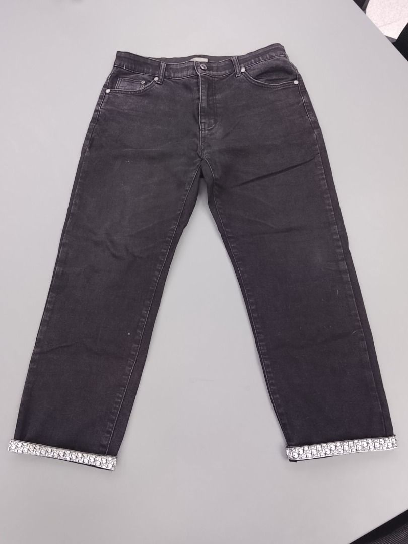 DIOR Black Jeans Regular Fit (Category: Luxury Apparel) located in Pasig City. Submitted by thriftshop.pinas (Listing ID 1464978423, Image 1). Description: DIOR Black Jeans Regular Fit -Size: 28 to 30 waist line -Lenght: 36.5 inch -Leg Hole: 7 inch -Complete tags -Issue: faded back patch.