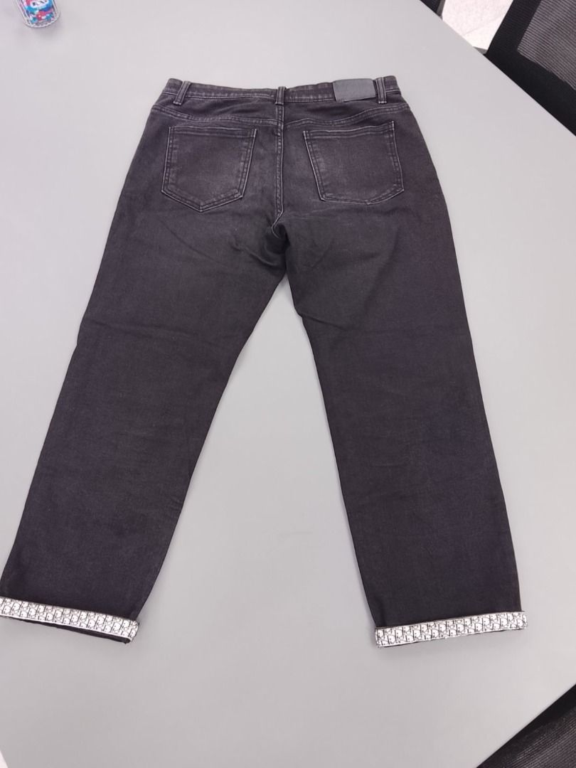 DIOR Black Jeans Regular Fit (Category: Luxury Apparel) located in Pasig City. Submitted by thriftshop.pinas (Listing ID 1464978423, Image 2). Description: DIOR Black Jeans Regular Fit -Size: 28 to 30 waist line -Lenght: 36.5 inch -Leg Hole: 7 inch -Complete tags -Issue: faded back patch.