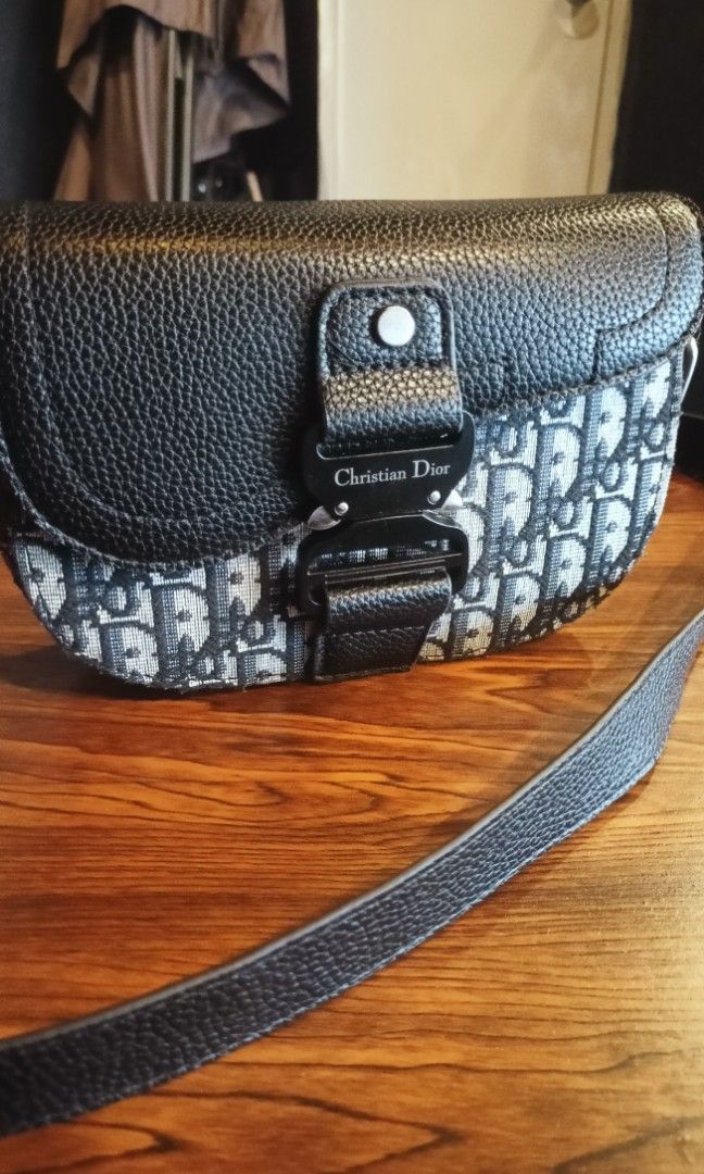 Dior sling bag (Category: Luxury Bags & Wallets) located in Manila. Submitted by osaze_27japanbags (Listing ID 1464977770, Image 1). Description: Dior sling bag no flaws,minimal sign of wear only small kindly pm me.