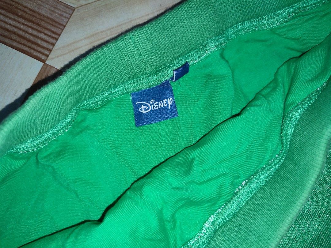 Disney Green Mickey Mouse Sparkly Skirt (Category: Skirts) located in Caloocan City. Submitted by faesrie (Listing ID 1465017837, Image 3). Description: - Official Disney merchandise with tag inside - Beautiful green fabric with subtle sparkle throughout - Comfortable adjustable drawstring waist - Cute lace trim tier at the bottom - Fun and playful statement piece.
