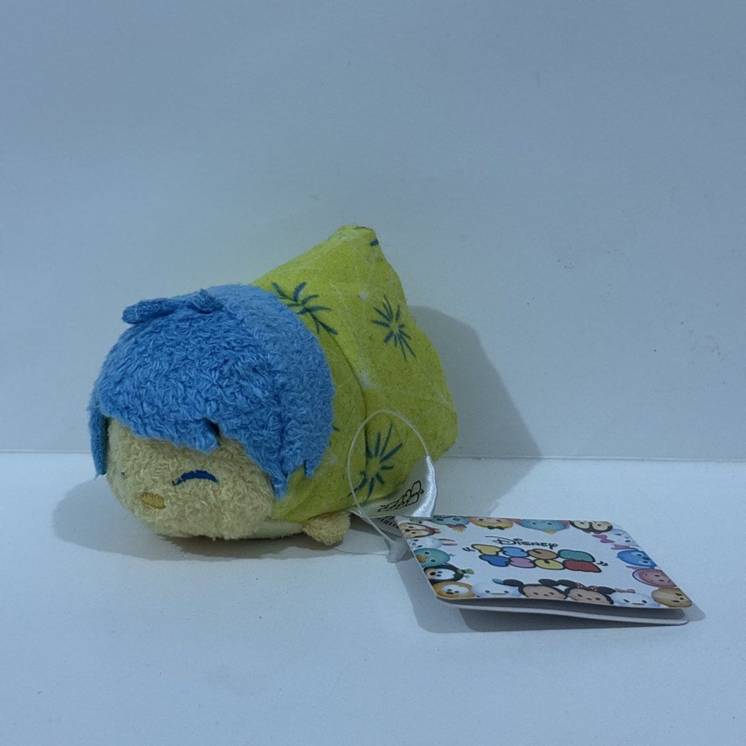Disney Tsum Tsum Joy Inside Out Plush with Tag (Category: Plushies & Soft Toys) located in Cavite. Submitted by eleanordc (Listing ID 1465043833, Image 1). Description: - Authentic Disney Tsum Tsum Joy mini plush from Inside Out - Features her iconic bright yellow floral dress and blue hair - Original tag still attached, carefully stored and in clean condition - Great addition for Pixar fans and plush collectors - Meetup or shipping options avail