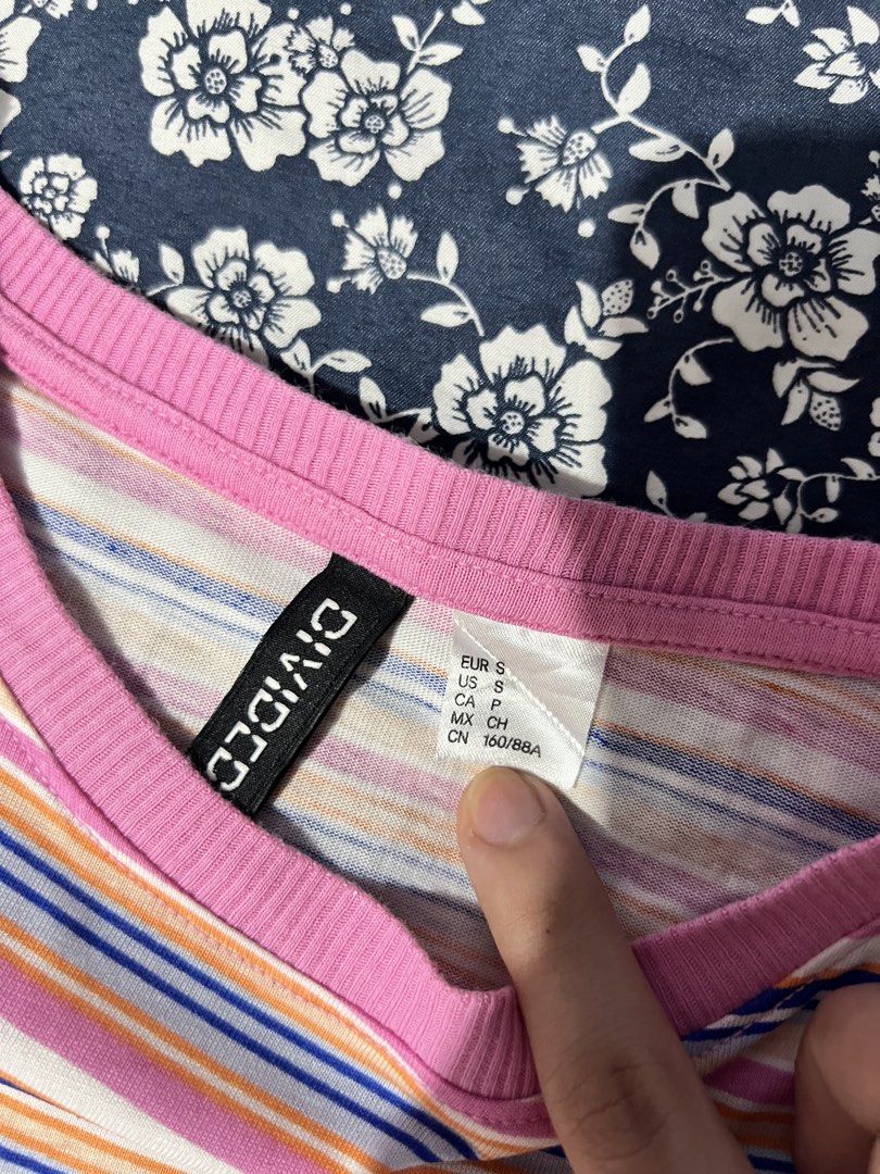 Divided H&M Multicolored Striped Crop Top Size S (Category: Shirts) located in Manila. Submitted by colesj (Listing ID 1465170501, Image 2). Description: H&M Divided Striped Pink Top – Size Small Pink striped top from H&M Divided. Used only once and still in very good condition. Simple and easy to style, perfect for casual outfits, school, or everyday wear. Size: Small Brand: H&M Divided Color: Pink Condition: Used Once RFS: Decluttering.