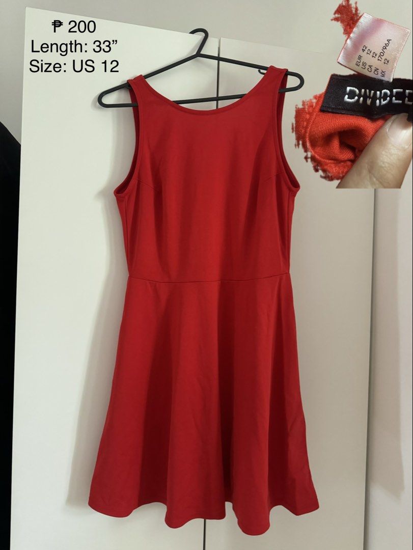Divided Red Dress Size US 12 Length 33" (Category: Dresses) located in Binan City. Submitted by izza1311 (Listing ID 1464997755, Image 1). Description: - Brand/Label: Divided by H&M - Color: Bright solid red - Size: US 12 / EUR 42 - Length: 33 inches - Style: Sleeveless, scoop neckline, fitted top with a flared skirt .