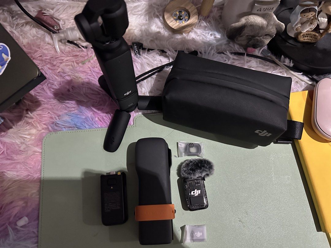 DJI Osmo Pocket 3 Creator Combo (Category: Cameras) located in Makati City. Submitted by tuazoncla43893 (Listing ID 1465094069, Image 3). Description: - DJI Osmo Pocket 3 camera with mini tripod handle - DJI Mic 2 transmitter equipped with a deadcat wind muff - Spare filters for versatile shooting - Custom molded zippered carrying case to store and protect the entire setup - still with warranty and box with plastic Freebies - Case worth 2500 - Pr