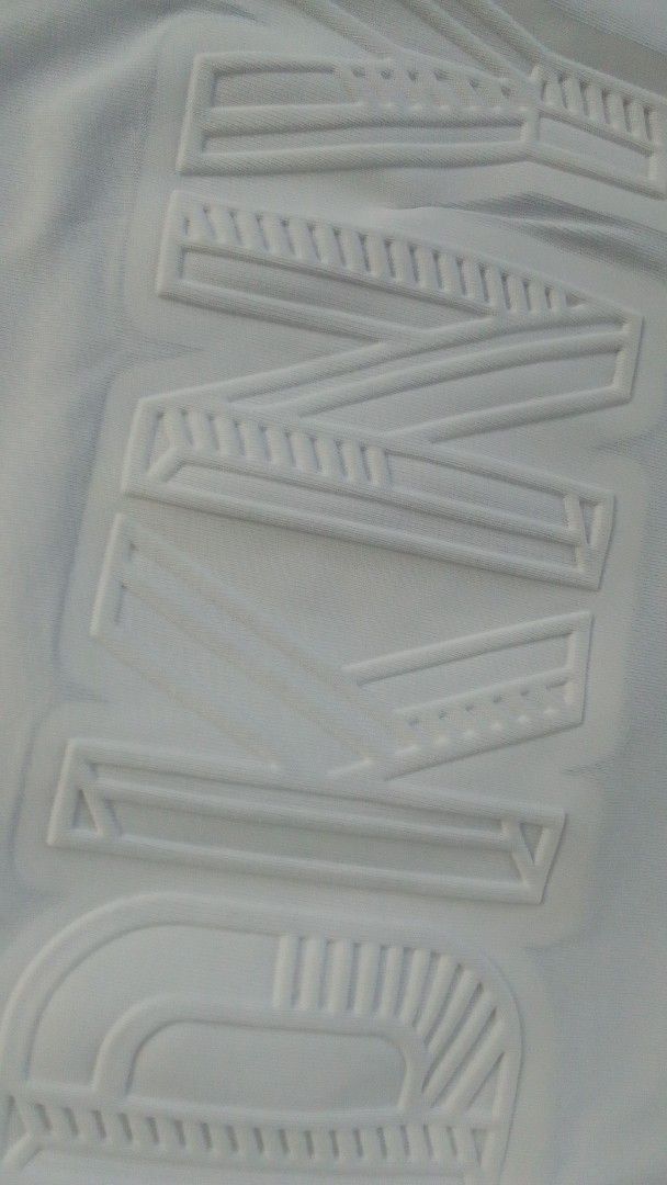 DKNY White Embossed Logo T-Shirt (L) (Category: Tshirts & Polo Shirts ) located in Cebu City. Submitted by babradede215 (Listing ID 1464992393, Image 3). Description: Length : 28 Width : 23 Color Rate : 9.9/10 .