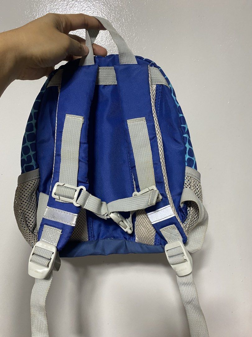 Dr. Kong Smart Kids Blue Dog Backpack (Category: Backpacks) located in Pasacao. Submitted by wengpullar37205 (Listing ID 1465097354, Image 2). Description: - Brand/Model: Dr. Kong Smart Kids Backpack - Color/Design: Blue with cute white dog embroidery (yellow spotted bandana) and orange zippers - Features: Side mesh pockets, breathable padded back panel, adjustable grey shoulder straps, and chest buckle - Condition: Used a few times, smooth zippe
