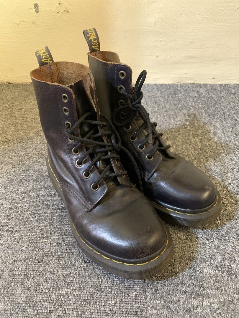 Dr. Martens 1460 Black Leather Boots (Category: Boots) located in Manila. Submitted by piolosalvador (Listing ID 1465100927, Image 1). Description: - Brand: Dr. Martens - Style: Iconic 8-eyelet boots - Colors available: Dark brown or black leather - Details: Signature yellow contrast stitching and AirWair heel loops - Soles: Classic oil, fat, acid, petrol, and alkali-resistant rubber bouncing soles - Hardware: Durable metal eyelets with black lac