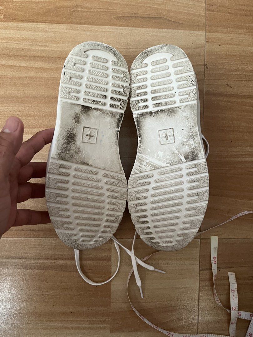 Dr. Martens Dante White Leather Sneakers (Category: Sneakers) located in Victorias. Submitted by lan1877 (Listing ID 1465073198, Image 3). Description: - Brand: Dr. Martens Dante - Color: White - Material: Leather upper - Size: UK 3 / US M 4 / US L 5 / EU 36 - Origin: Made in Vietnam - Style: Low-top, lace-up with signature branded insoles and chunky soles - Condition: Pre-loved with minor scuffs on the leather and normal dirt on bottom treads.