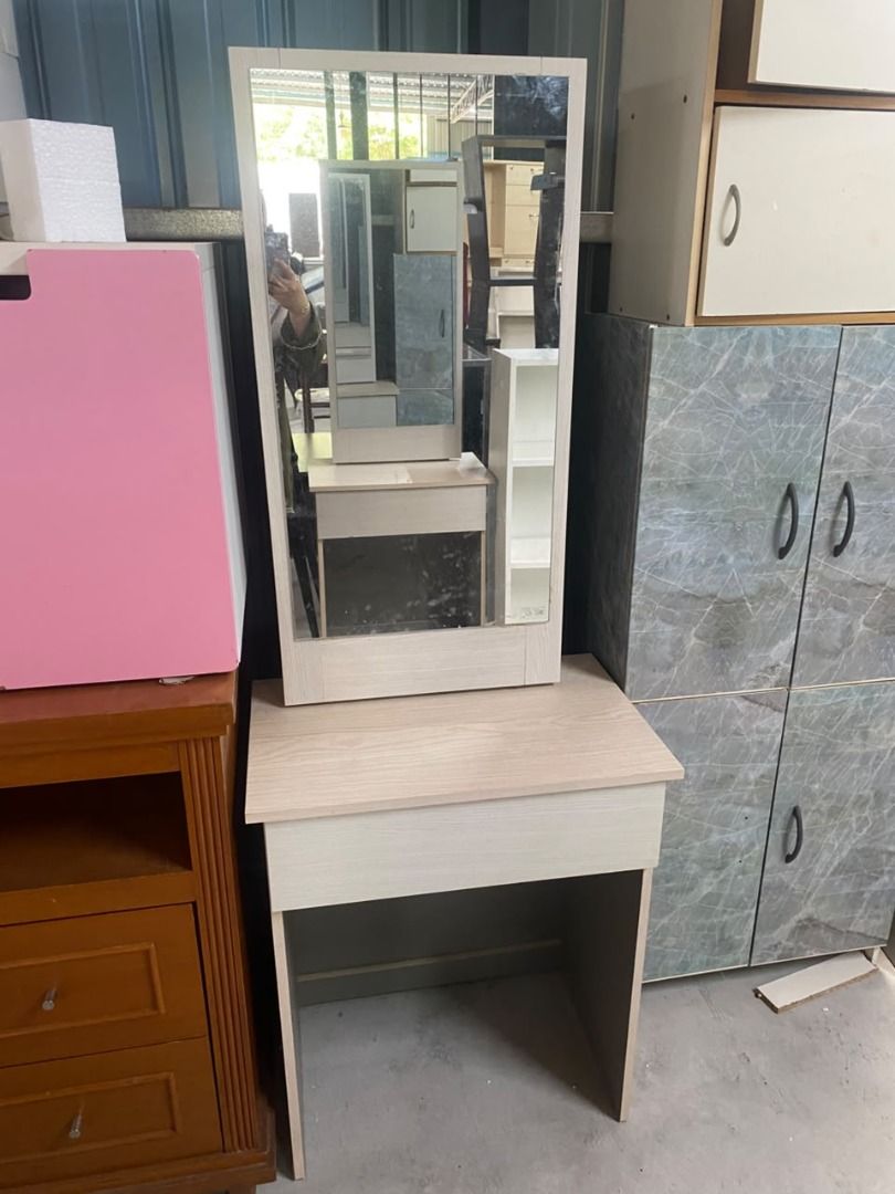 Dressing Table (Category: Tables & Sets) located in Puchong. Submitted by aziralhamzah (Listing ID 1465022999, Image 1). Description: - Style: Simple, modern design in a neutral beige wood grain finish - Features: Includes a tall rectangular mirror and a convenient single drawer for storage - Size: Compact and space-saving, ideal for small bedrooms - Condition: Excellent - Self-pickup or delivery options available upon request.