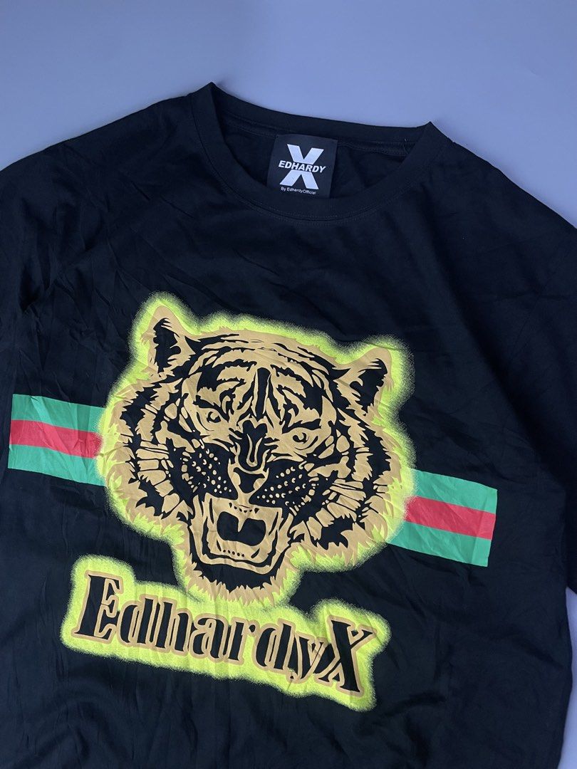 Ed Hardy X Black Tiger Graphic Tee Size L (Category: Tshirts & Polo Shirts ) located in Veruela. Submitted by blinkban_thrift (Listing ID 1465071564, Image 2). Description: Ed hardy 22x28 As new condition No issue 350+sf Location: Mindanao.