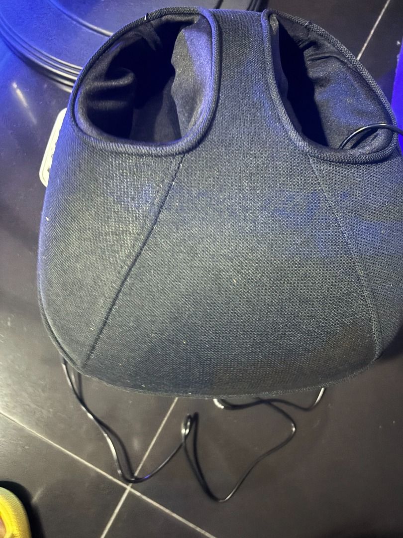 Electric foot massager machine (Category: Massage Devices) located in Quezon City. Submitted by rocky1224 (Listing ID 1465109156, Image 1). Description: Black electric foot massager with two padded openings for feet. Fabric exterior construction. Fully functional relaxation equipment, great for tired feet after a long workday. Easy to operate. Never been used, and with box..