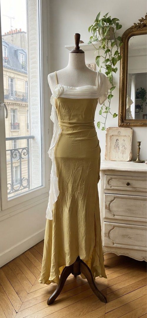 Elegant plus size Formal Long dress (Category: Dresses) located in Cavite. Submitted by wishie_collects (Listing ID 1465036342, Image 1). Description: L - XL This is a floor-length, asymmetrical evening gown in a muted avocado color. It features a one-shoulder design with a draped white fabric overlay and a large white rosette on the bust. The skirt is ruched on the sides and has an asymmetrical, high-low hemline, with a flowing white ruffle casc