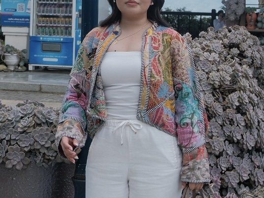 Elinora Kaia Jacket (Category: Coats, Jackets and Outerwear) located in Manila. Submitted by declutterdoctor (Listing ID 1465012814, Image 1). Description: - Brand: Elinora - Design: Colorful multi-pattern patchwork with kantha stitch detailing - Fit: Open front, cropped length, and loose batwing sleeves - Details: Striped piping along the collar, hem, and cuffs - Versatility: Reversible design featuring a different patchwork layout on each side 