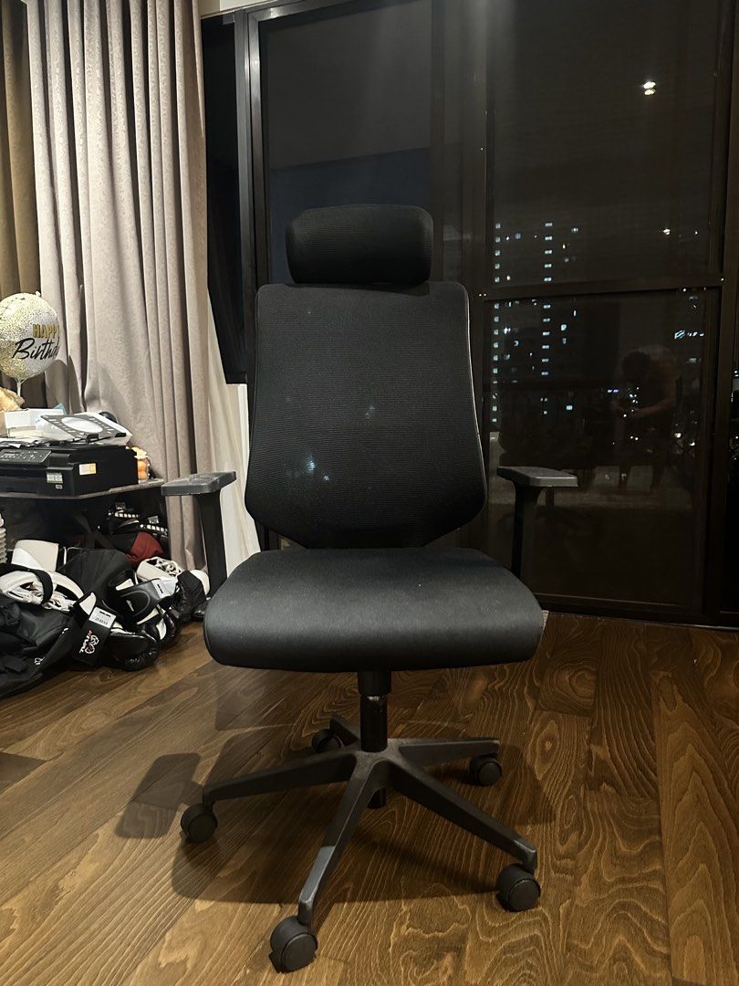Ergonomic Mesh Office Chair with Headrest (Category: Office Furniture & Fixtures) located in Pasig City. Submitted by ajpfinds (Listing ID 1465070874, Image 3). Description: - Ergonomic office chair with breathable black mesh - Adjustable headrest and comfortable padded armrests - Sturdy five-star base with smooth-rolling caster wheels - Fully functional height adjustment and tilt lock lever - Solid build quality, very clean and work-ready.