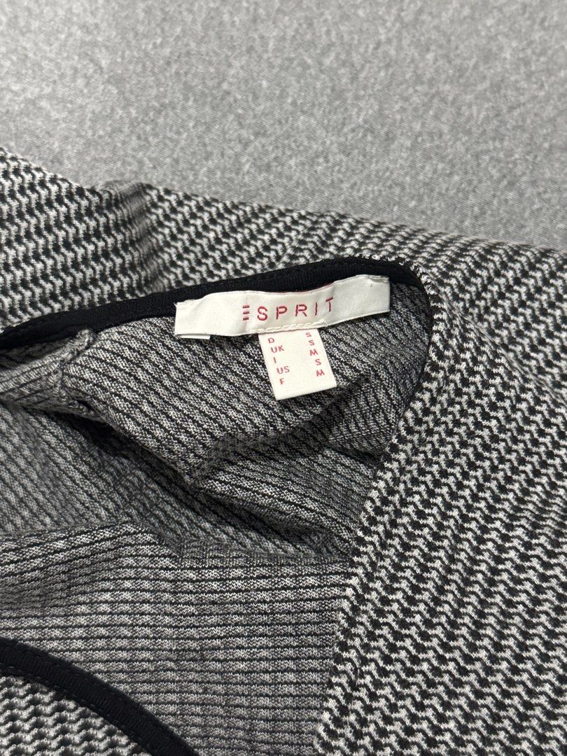 Esprit Grey Black Patterned Midi Dress Size M (Category: Dresses) located in Taguig. Submitted by rzkei (Listing ID 1465124686, Image 3). Description: - Size: Medium (Tag on collar) - Fits M-L - Fit: Form-fitting with comfortable stretch fabric - Versatility: Ideal for office wear or casual outings 📍Taguig.