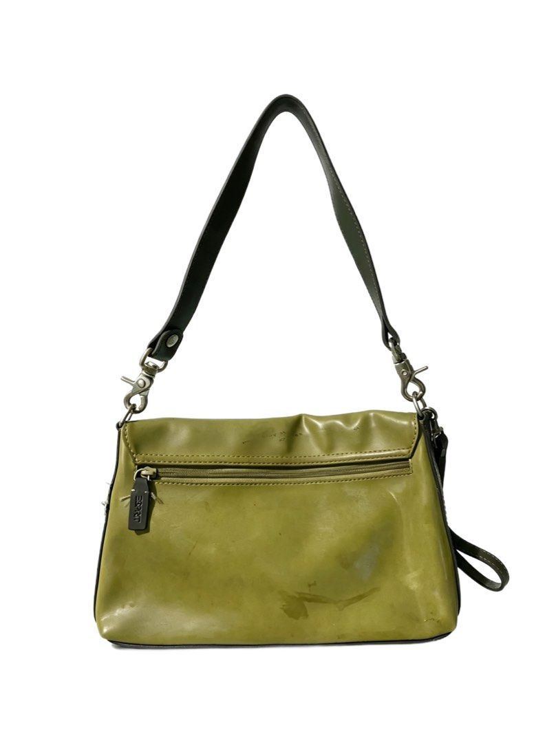 Esprit Olive Green Shoulder Bag with Charm (Category: Shoulder Bags) located in Quezon City. Submitted by un0oo (Listing ID 1465013277, Image 2). Description: - Brand: Esprit - Color: Olive green with dark brown trim and stitching - Includes: Matching branded key charm - Storage: Front flap closure, back zippered pocket, and spacious interior for daily essentials - Strap: Detachable dark strap with metal clips - Style: Mid-sized, structured shoul