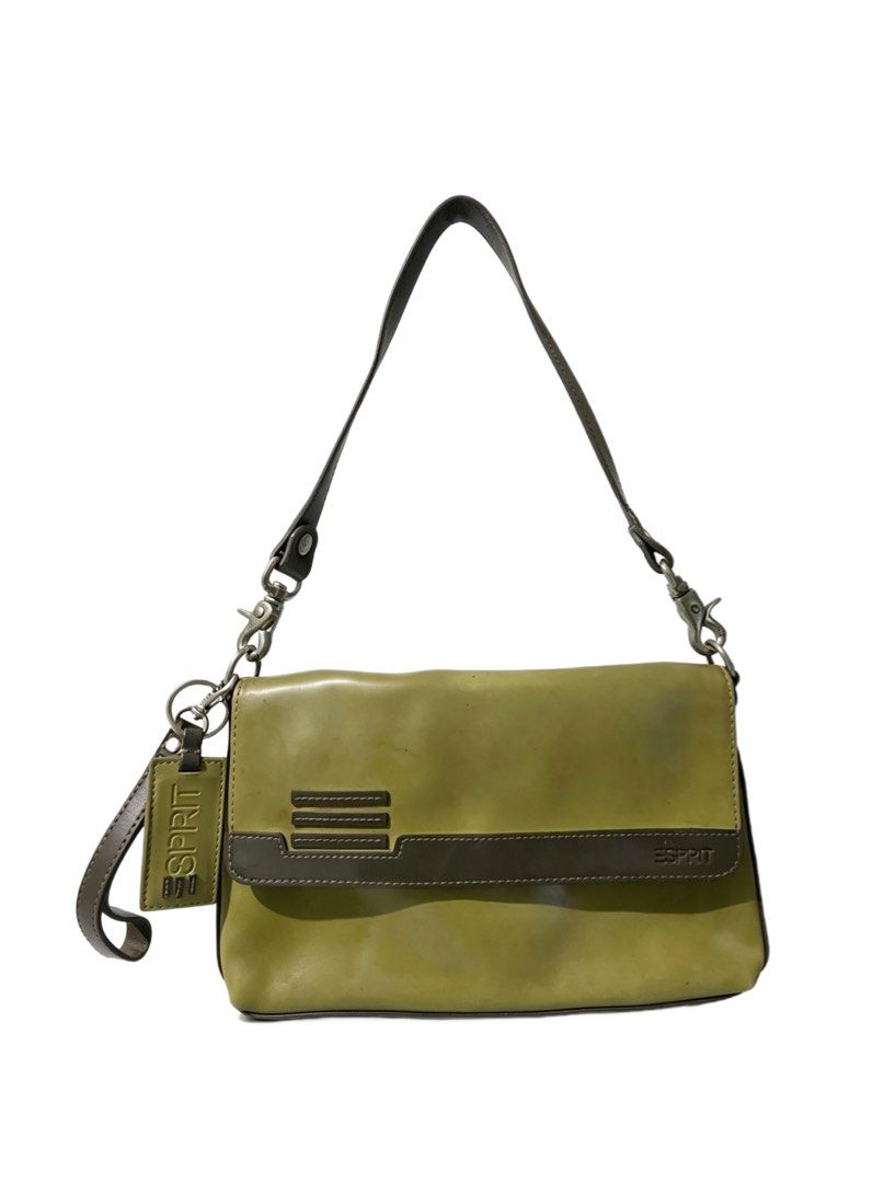 Esprit Olive Green Shoulder Bag with Charm (Category: Shoulder Bags) located in Quezon City. Submitted by un0oo (Listing ID 1465013277, Image 1). Description: - Brand: Esprit - Color: Olive green with dark brown trim and stitching - Includes: Matching branded key charm - Storage: Front flap closure, back zippered pocket, and spacious interior for daily essentials - Strap: Detachable dark strap with metal clips - Style: Mid-sized, structured shoul